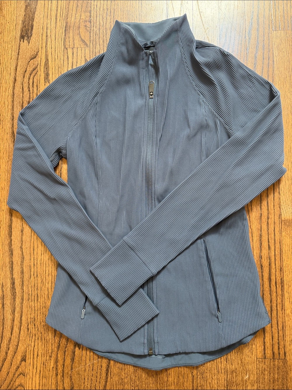 NWOT Athleta women's jacket, full zip, zippered front picket, thumbhole sleeves